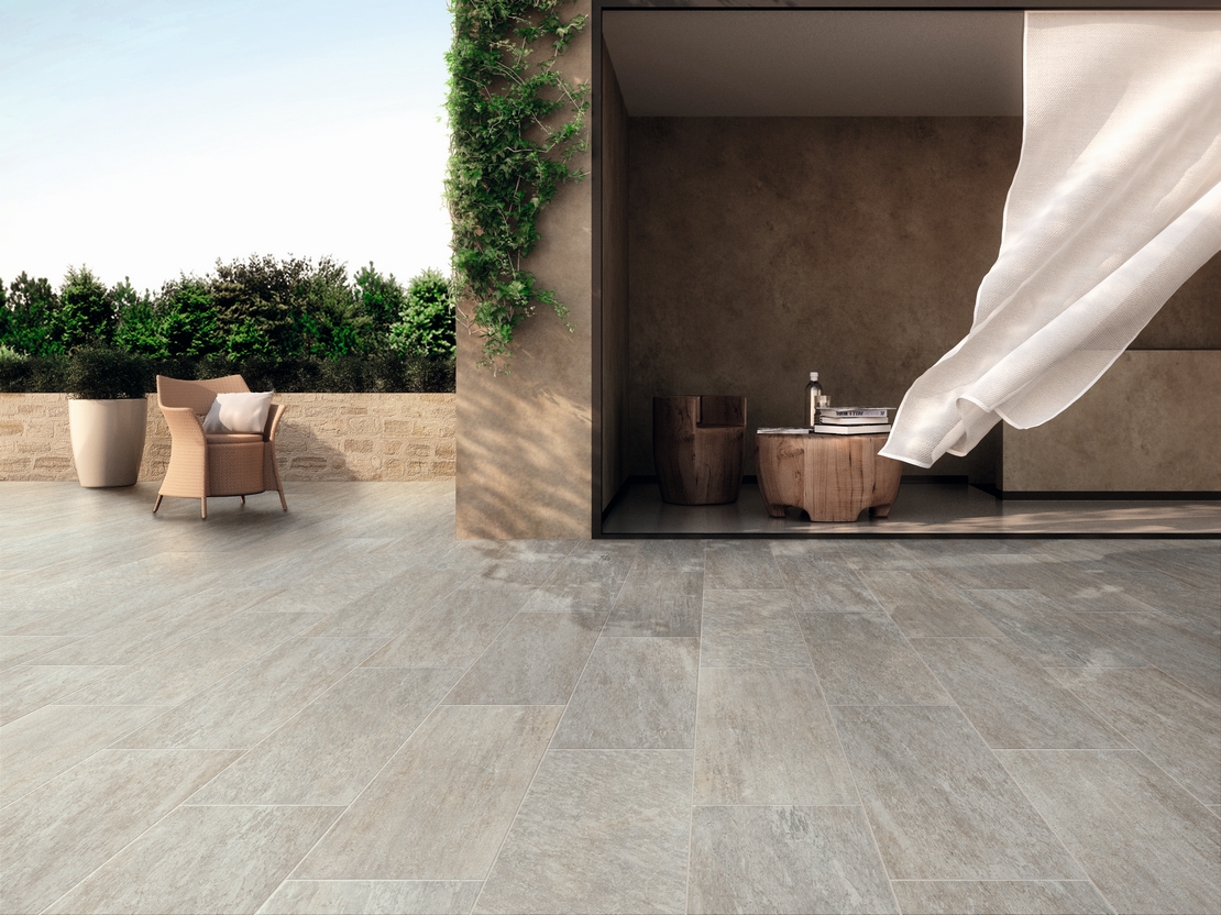 Modern patio with outdoor stone-effect porcelain tile flooring