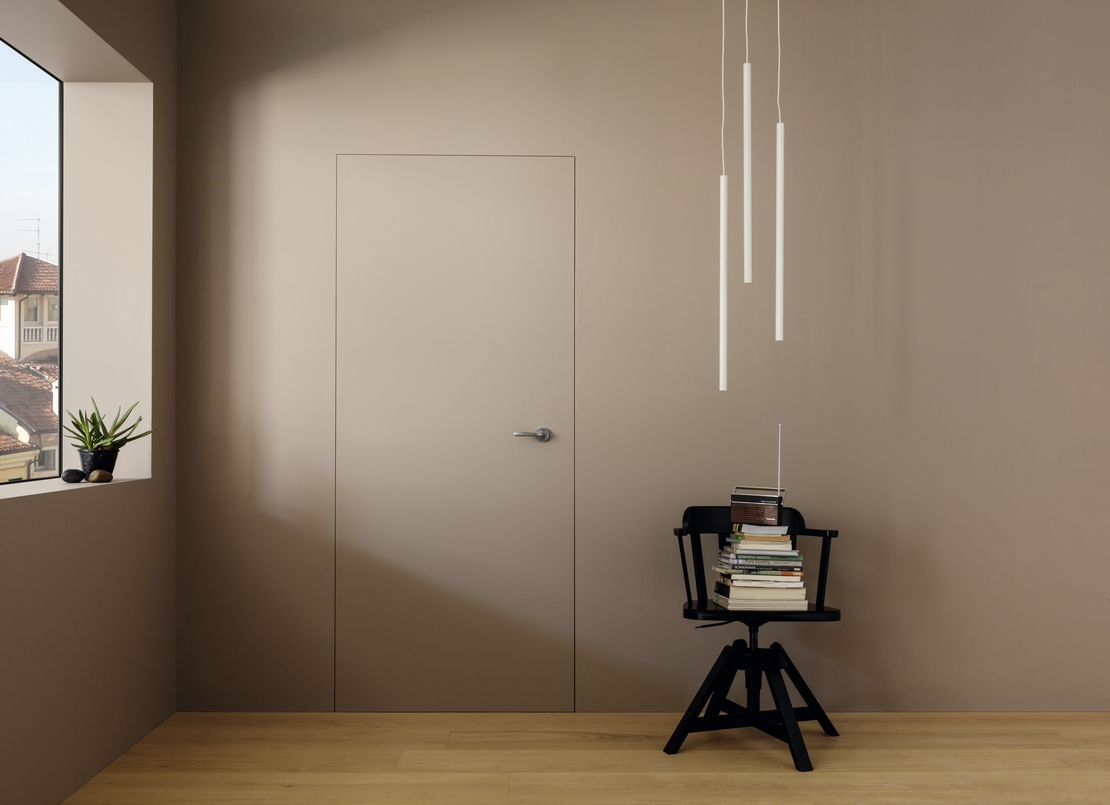 Modernes Wohnzimmer: Boden in Holzoptik, Wände in minimalistischen Grau-Beige-Tönen - Inspirationen Iperceramica