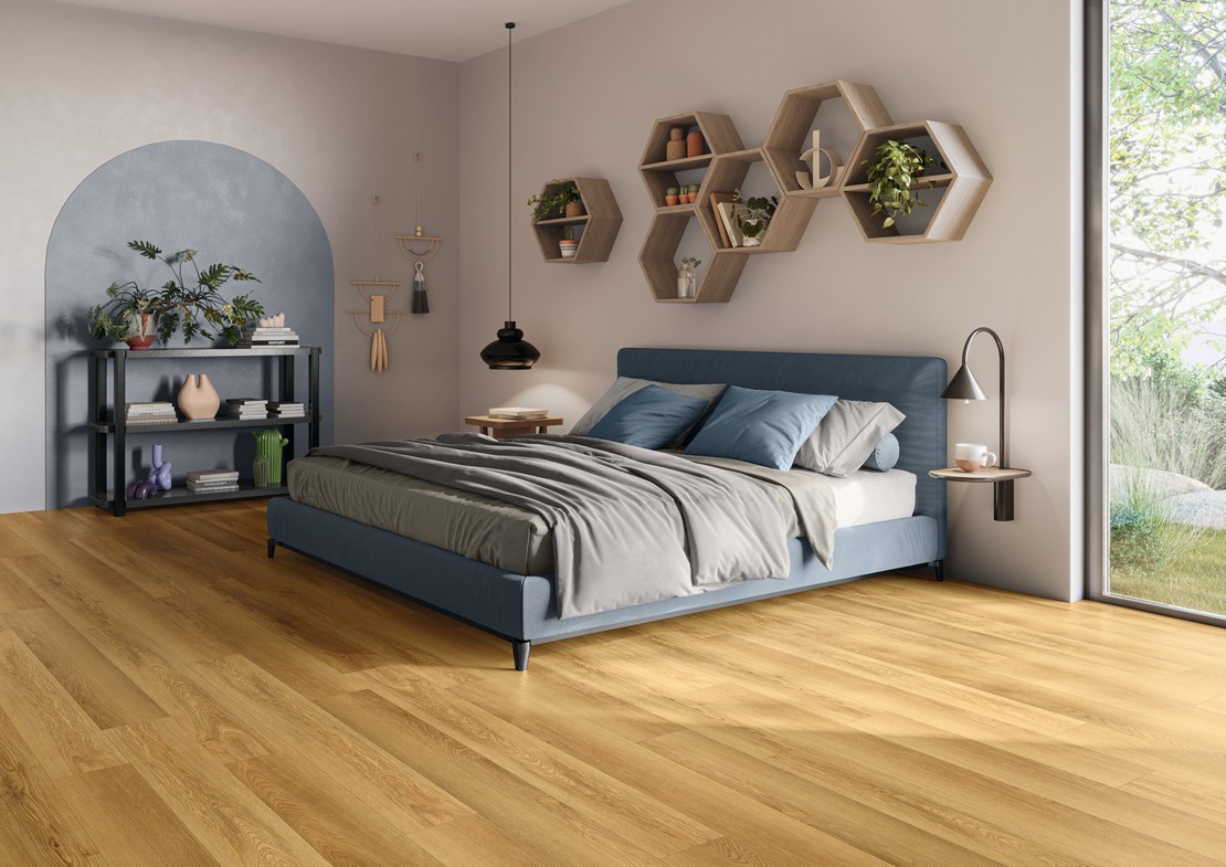 Modern bedroom with beige wood-effect flooring