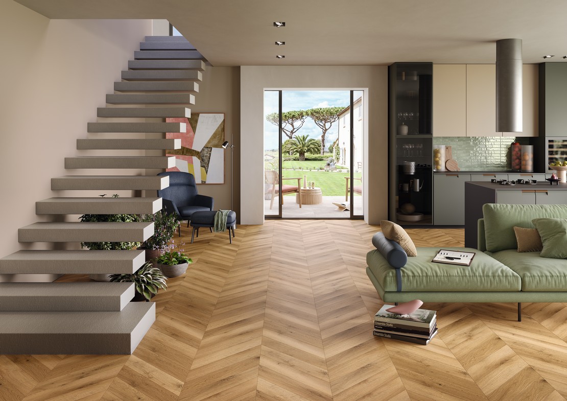 Séjour open space avec cuisine moderne et élégante, sol pvc effet bois chêne chevron - Inspirations Iperceramica