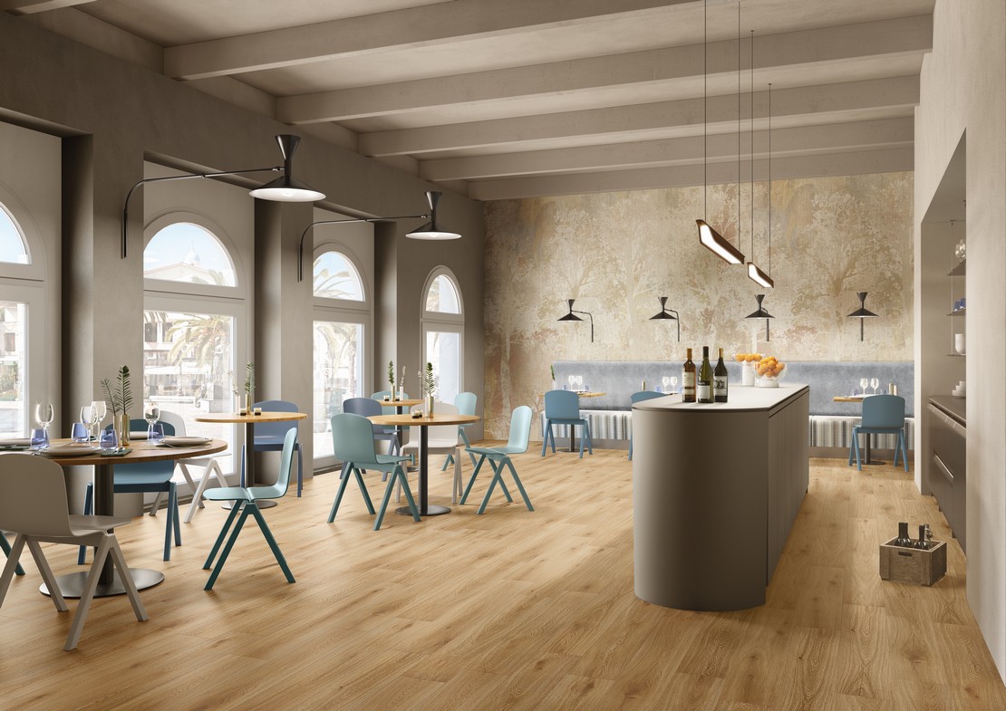 Modern restaurant with wood-effect flooring and wallpaper
