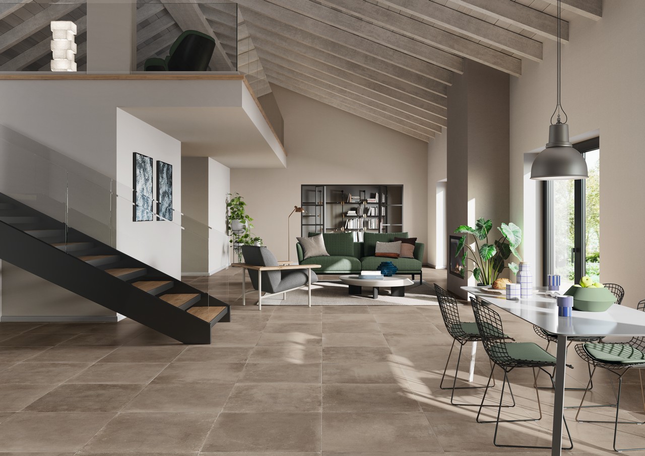 Modern open-plan living room, industrial gray beige concrete-effect stoneware flooring