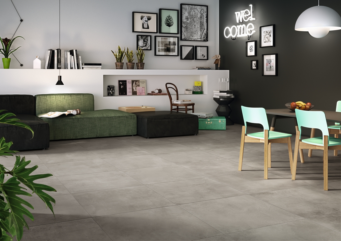 Modernes Wohnzimmer: Boden in Zementoptik und Schwarztöne - Inspirationen Iperceramica