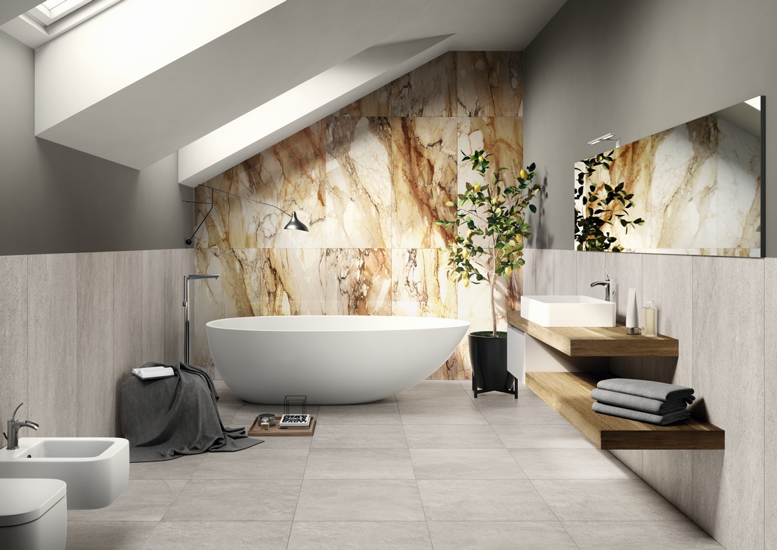 Modern and minimalist bathroom. Industrial concrete effect, classic marble, freestanding bathtub.
