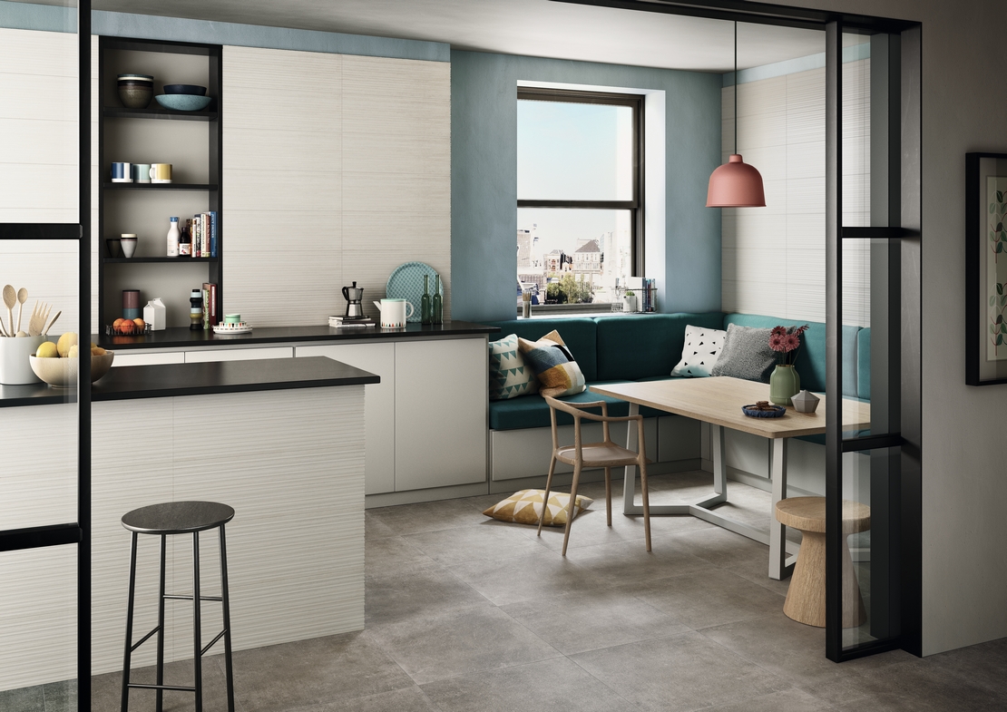 Modern kitchen with a concrete-effect peninsula in gray and white