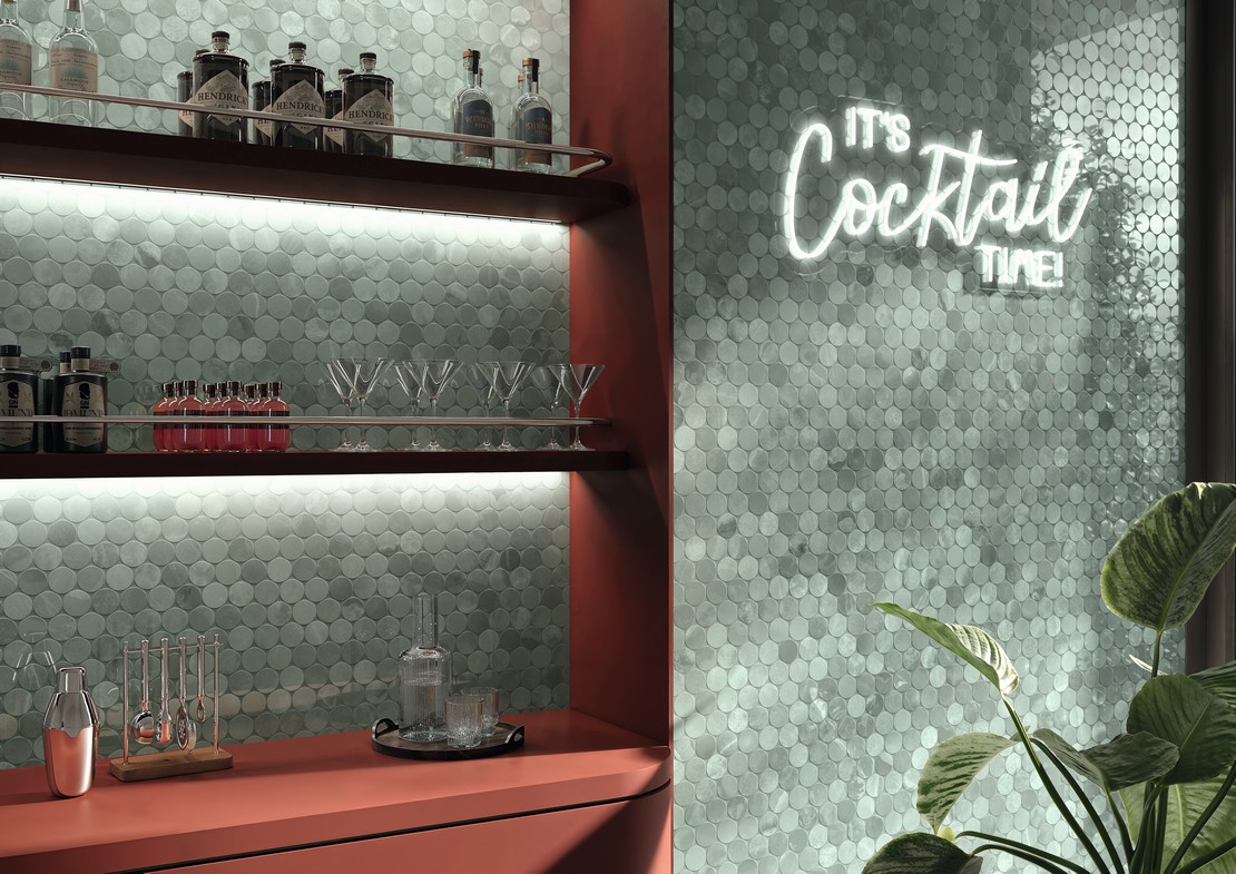 Modern and colorful bar with green mosaic wall covering