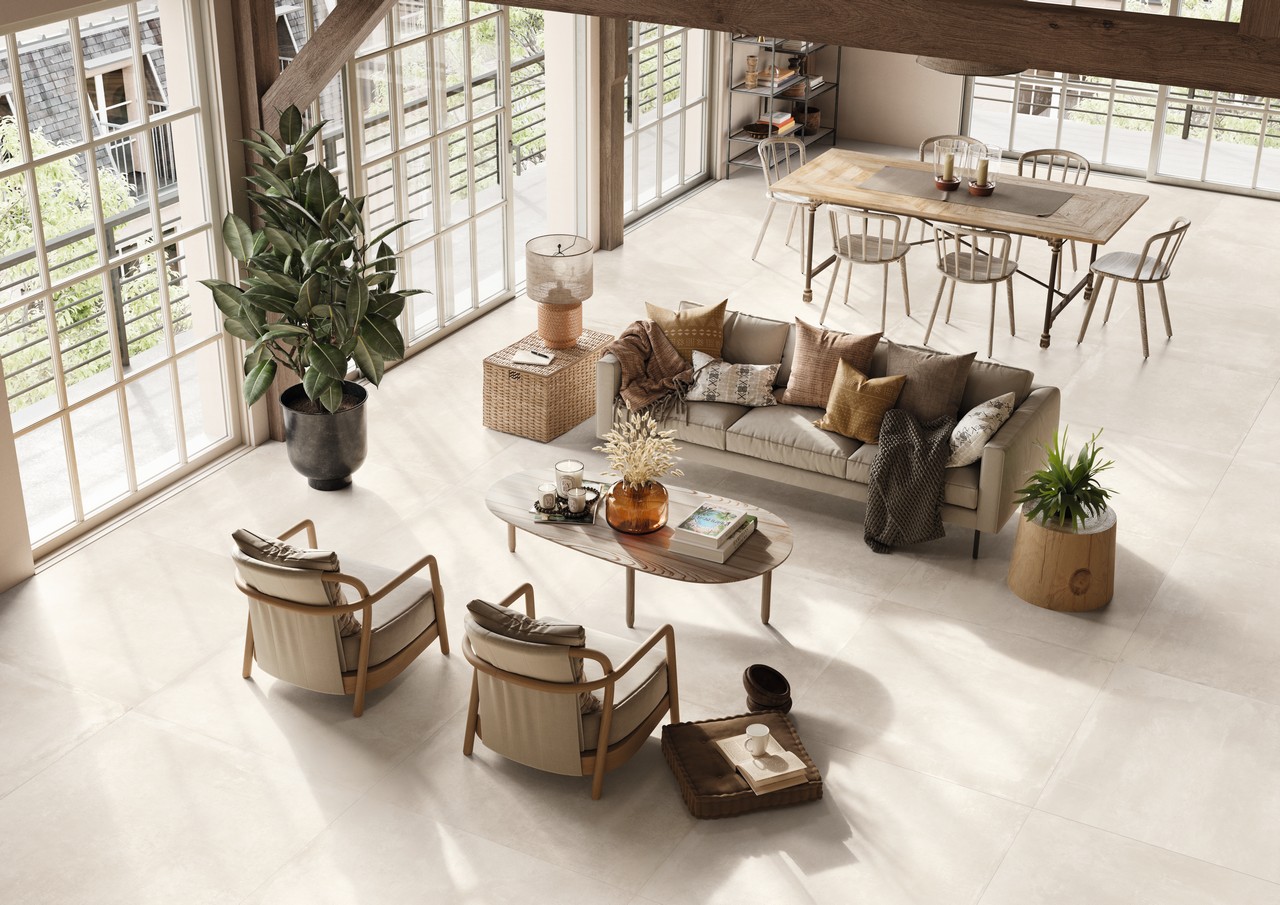 Luxuriöses Wohnzimmer in hellen Tönen mit Feinsteinzeug Boden in Zementoptik - Inspirationen Iperceramica