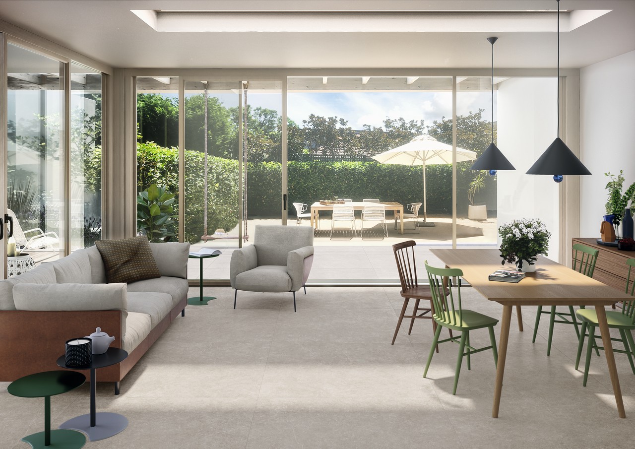Elegantes modernes Wohnzimmer mit Boden in Grautönen Steinoptik - Inspirationen Iperceramica