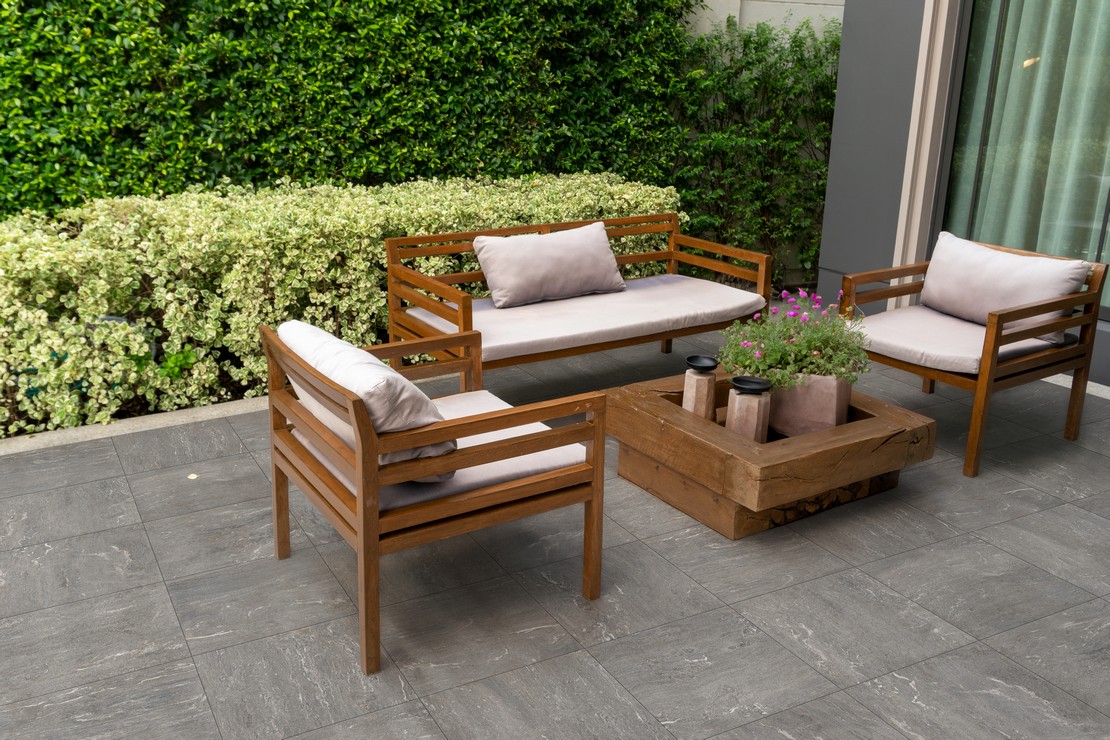 Traditional exterior with stone-effect terrace