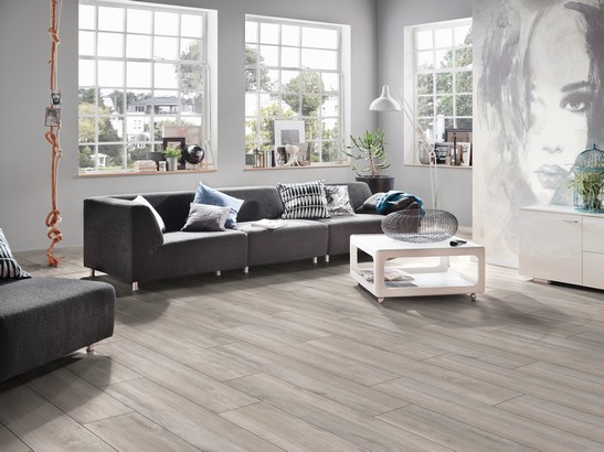 Elegant living room with modern-style gray wood-effect flooring
