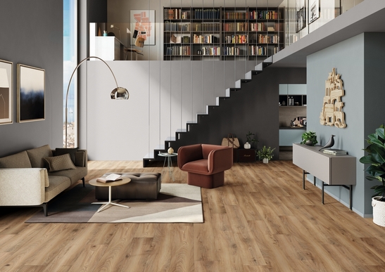 Modern open-plan living room in gray and blue with elegant wood-effect laminate flooring