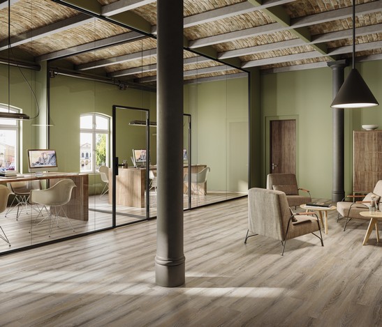 Modern office in shades of green with wood-effect flooring for a rustic touch