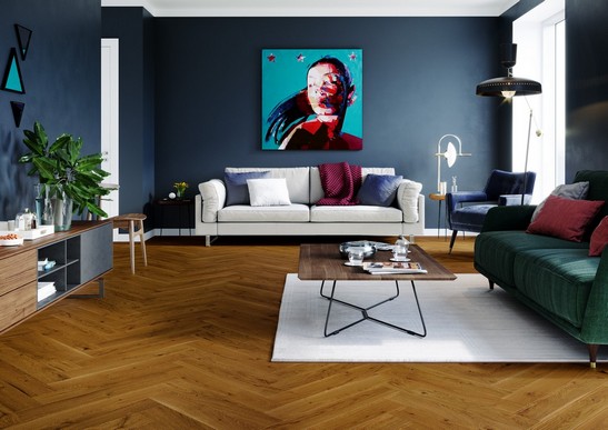 Elegant living room in shades of blue with brown parquet