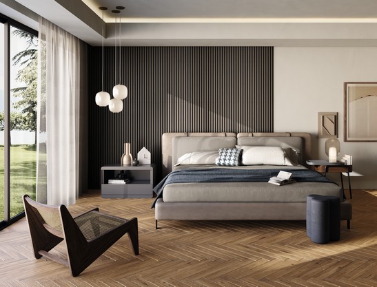 Camera da letto di lusso con pavimento in legno marrone e pareti grigie
