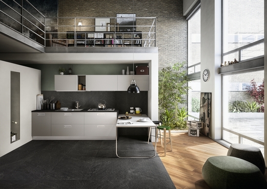 Minimal modern kitchen: black stone-effect flooring for an industrial touch