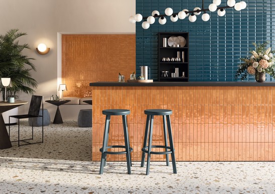 Elegant restaurant/bar with colorful tiles and terrazzo-effect flooring