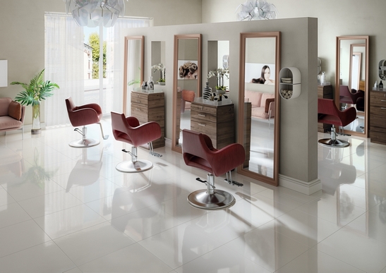Modern store with glossy white marble-effect flooring