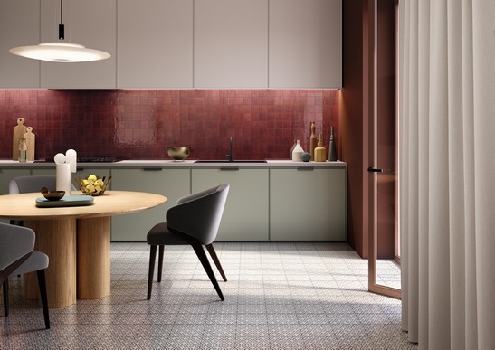 Cuisine moderne avec carrelage rouge et décoré 