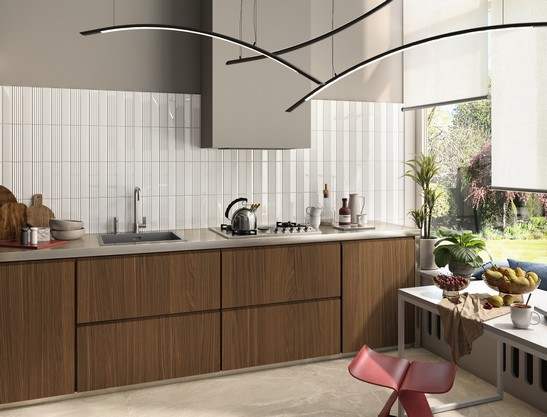 White linear kitchen with gray stone-effect flooring