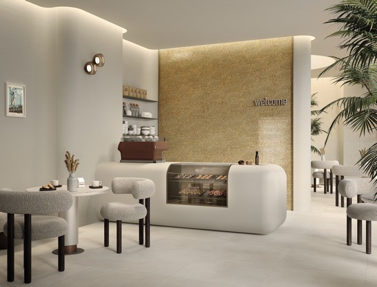 Modernes minimalistisches Cafè mit Mosaik Wandverkleidung und Fußboden in Zementoptik Modernes minimalistisches Cafè mit Mosaik Wandverkleidung und Fußboden in Zementoptik