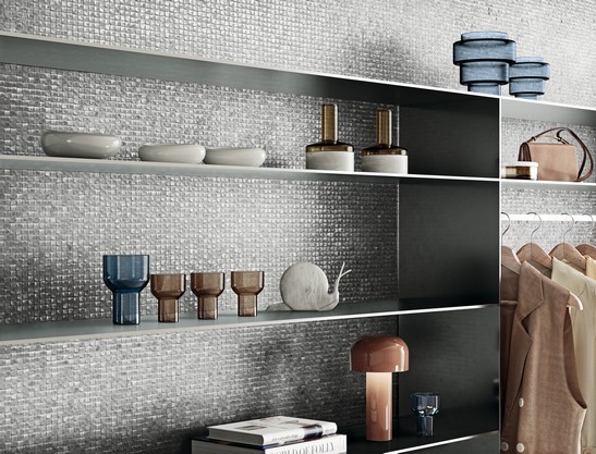 Modern industrial-style store with elegant metal-effect mosaic tiling