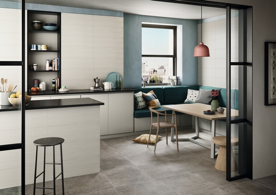 Modern kitchen with a concrete-effect peninsula in gray and white