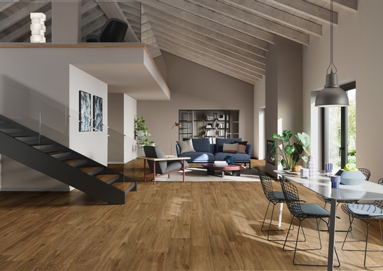 Soggiorno moderno open space, pareti blu e pavimento effetto legno beige, grigio