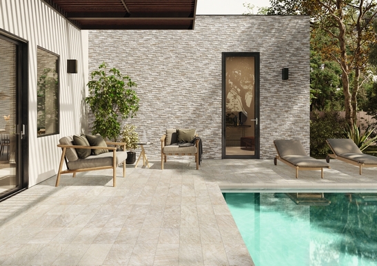 Modern poolside patio, white stone-effect porcelain tile flooring