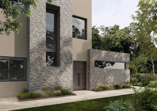 Maison moderne avec carrelage effet pierre quartzite dans des tons de gris.