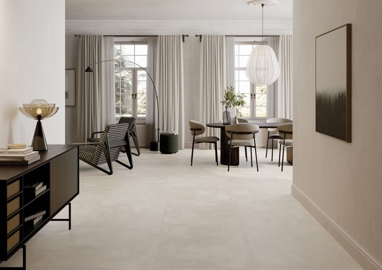 Modernes luxurös-Wohnzimmer mit beigem Betonoptik am Boden 