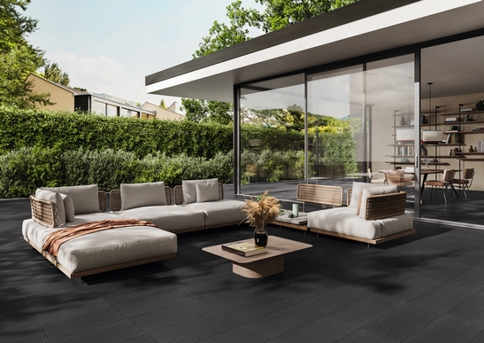 Rustic country house porch with gray stone-effect flooring