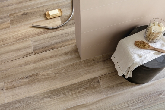Modern bathroom with shower. Rustic wood-effect and minimalist beige walls.