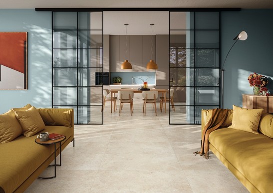 Modern and colorful living room with stone-effect flooring