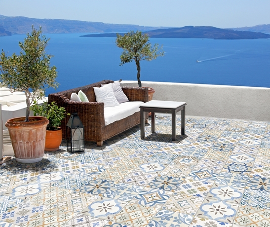 Modern terrace, decorated cement tile effect flooring in shades of white, blue, and beige