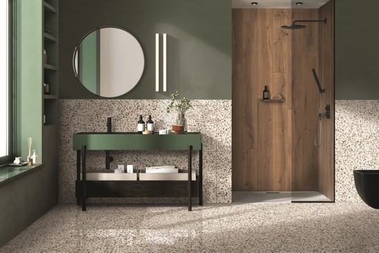 Salle de bains moderne avec grès cérame imitation bois et effet terrazzo pour une touche vintage.