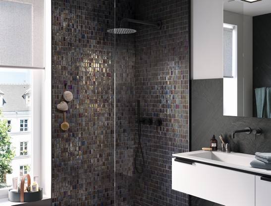 Industrial-style bathroom with metal effect mosaic wall tiles