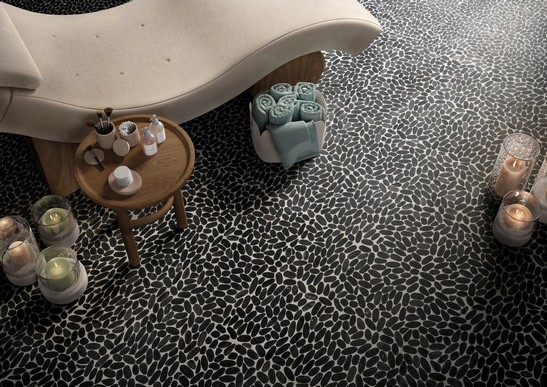 Modern spa with black stone mosaic flooring