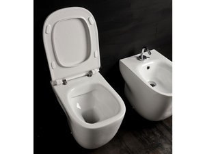 WC à poser Wild sans bride 52x34 cm adossé au mur sortie horizontale/verticale blanc brillant