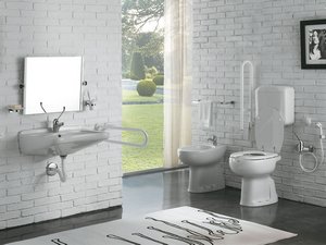 Behinderten-WC Saniwat distanziert Abfluss auf dem Fußboden glänzend weiß